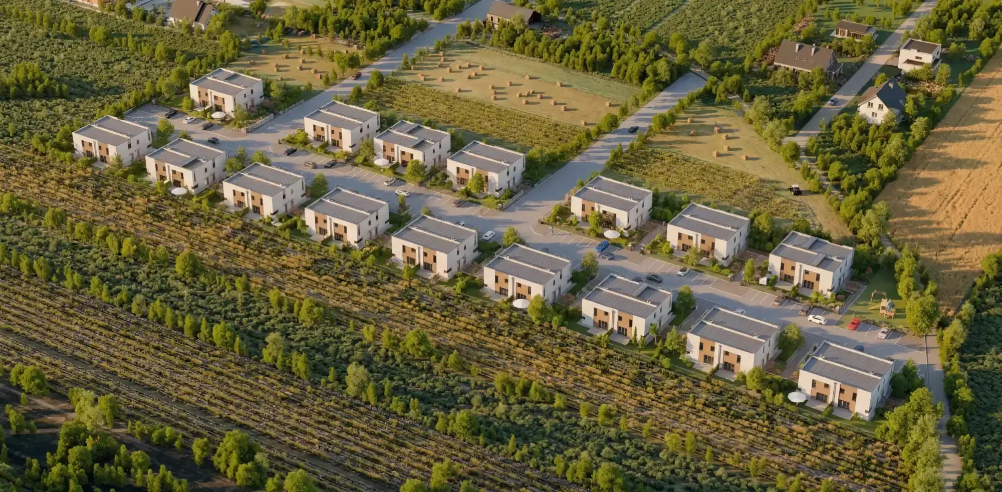 Osiedle szesnastu bliźniaków wśród pól, widok z lotu ptaka